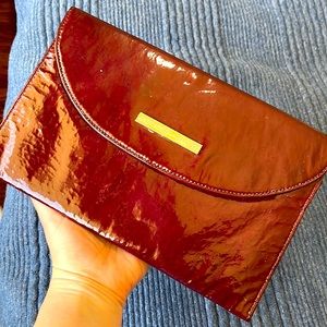 Red patent leather Catherine Rapetti clutch